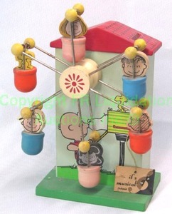 lot 120 image: Vintage 1972 Peanuts ferris wheel musical coin bank
