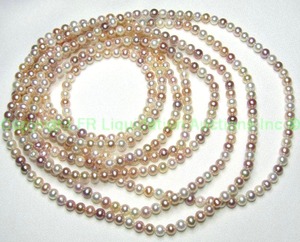 lot 18 image: Opera length continuous multi color pastel ombre pearl necklace. 96L Finely individually knotted.