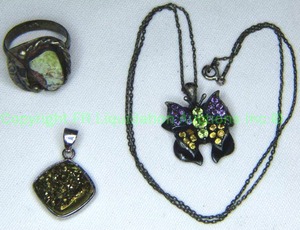 lot 153 image: Green Mohave Turquoise ring (Marked 925,size 6.5), Golden Drusy pendant Marked 925, Multi gemstone butterfly pendant (Amethyst, Citrine, Peridot) on sterling 18 chain. Both Marked 925