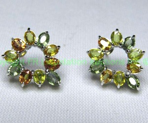 lot 56 image: Sterling silver and multi-color sapphire poststud earrings. 4.58 cttw Sapphires. Marked 925 on butterfly backs. In box w COA from Gems TV Sapphires tested.