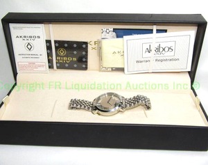 lot 61 image: Akribos XXIV stainless steel Swiss quartz wrist watch in original box