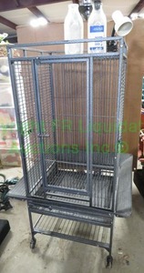 lot 202 image: Large free standing bird cage with water bottles and clip lamp