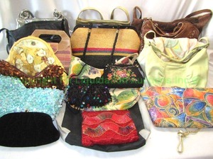 lot 26 image: Assorted cow hyde leather name brand purses including Elliot Lucca, Loredana, Miriam, and more