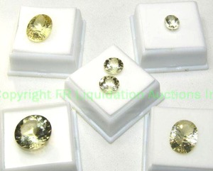 lot 312 image: (6) Yellow Labradorite gemstones. Varying sizes.