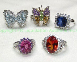lot 316 image: (5) Sterling silver rings. Includes Blue Topaz butterfly ring (Size 7), Amethyst, Citrine and Peridot Butterfly Ring (size 7.75) , Blue syn. Sapphire ring (Size 8), Syn. Orange Sapphire (Size 7) and Syn. Pink Sapphire (Size 6). All marked 925