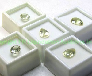 lot 317 image: (5) Yellow Labradorite gemstones. Varying sizes.