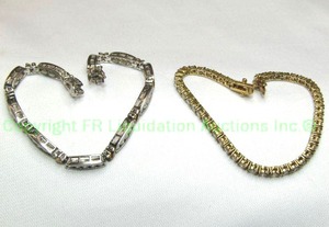 lot 95 image: (2) Sterling silver and diamond simulant tennis bracelets. Both marked 925. Both 8.5L. Hidden box catches with safety clasps.