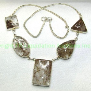 lot 143 image: Sterling silver tourmalated quartz cabochon station necklace. Marked 925. S- Clasp. 18L