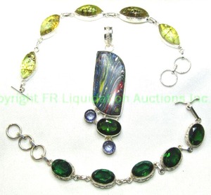lot 147 image: (3) Sterling silver pieces. Includes a matching green glass station bracelet and pendant and a yellow glass simulated tourmalated quartz bracelet. Bracelets are 7L. Pendant 3L. All pieces marked 925.