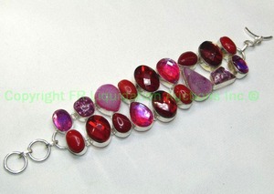 lot 150 image: Sterling silver red quartz and unpolished drusy bracelet. Toggle clasp. Marked 925. 7.5L
