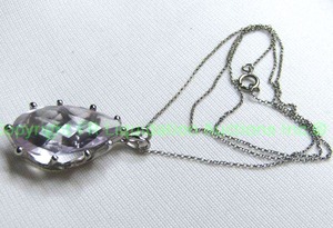 lot 333 image: Sterling silver pendant mount with tear drop faceted quartz on an 18 sterling chain. Approx 18 carats. Both chain and mount marked 925