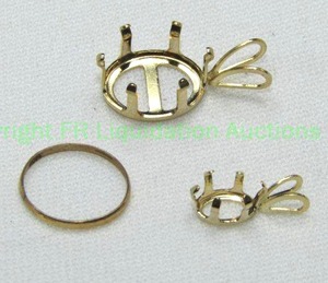 lot 336 image: (3) 10K yellow gold findings. Includes (2) pendant mounts and large jump ring. All marked 10K.