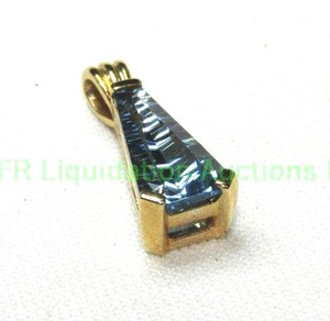 lot 344 image: 10K yellow gold London Blue Topaz unusual pyramid shape pendant. Marked 10K. Topaz tested.