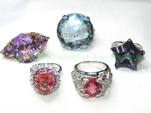 lot 350 image: (5) Large Sterling silver statement rings. Includes vermeil Amethyst (Size 7), Faceted Blue Topaz round (size 7.5), London Blue Topaz Star (Size 6.5 (Not mounted), and (2) Syn. Pink Sapphire rings (sizes 7.50, 7.25). All marked 925.