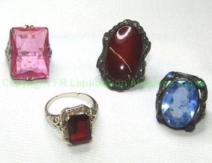 lot 351 image: (4) Sterling silver and metal vintage rings. Includes a sterling Garnet ring (size 7.5, marked 925) and 3 vintage glass rings. (unmarked, Sizes - (1) adjustable, 3.5, and 3)