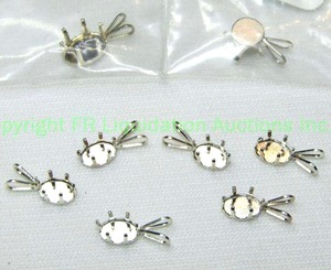 lot 372 image: (8) Sterling silver snap tight pendant mounts. varying sizes. All marked 925