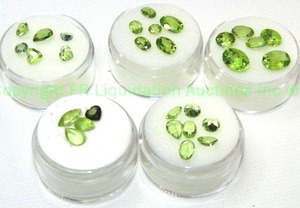 lot 397 image: (5) Green gemstone parcels. Varying sizes and quantities.