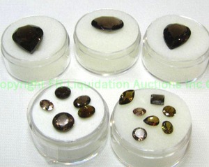 lot 400 image: (5) Garnet purple gemstones. Varying sizes and quantities.