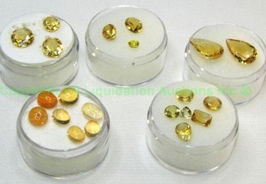 lot 403 image: (5) Yellow  Orange gemstones. Varying sizes and quantities.