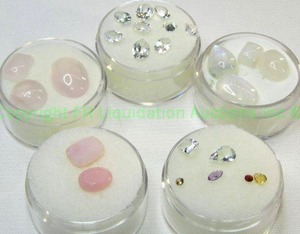 lot 407 image: (5) Clear  White gemstones. Varying sizes and quantities.