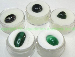 lot 409 image: (5) Black  Green gemstones. Includes Malachite & Hematite. Varying sizes and quantities.