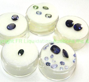 lot 415 image: (5) Iolite  Blue gemstones. Two parcels marked Iolite 9x7 and 8x6. Varying sizes and quantities.