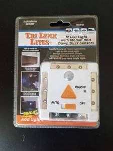 lot 190 image: LYNX 12-LED LIGHT WITH MOTION AND DAWNDUSK SENSORS  WHITE #00026