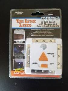 lot 196 image: LYNX 12-LED LIGHT WITH MOTION AND DAWNDUSK SENSORS  WHITE #00026