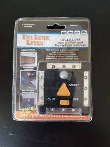lot 188 image: LYNX 12-LED LIGHT WITH MOTION AND DAWNDUSK SENSORS  BLACK- #00027B