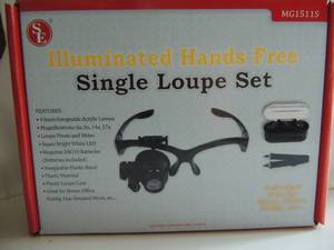 lot 61 image: SE Single loupe set illuminated hangs free