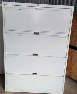 lot 51 image: STEELCASE METAL 4-DRAWER LATERAL FILING CABINET AS SHOWN. APPROX. 36W x 18D x 52H.