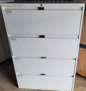 lot 70 image: STEELCASE METAL 4-DRAWER LATERAL FILING CABINET AS SHOWN. APPROX. 36W x 18D x 52H.