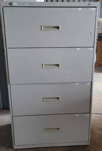 lot 99 image: METAL 4-DRAWER LATERAL FILING CABINET AS SHOWN. APPROX. 30W x 19D x 53H.