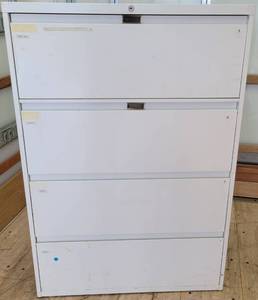 lot 100 image: METAL 4-DRAWER LATERAL FILING CABINET AS SHOWN. APPROX. 36W x 18D x 52H.