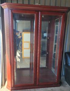 lot 2 image: LARGE 64W x 21D x 80H LIGHTED WOOD FRAME AND GLASS DISPLAY CABINET WITH GLASS SHELVES NOT PICTURED IN STYLE, COLOR, AND CONDITION SHOWN. MUST SEE