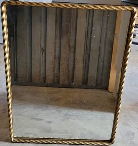 lot 32 image: HEAVY WROUGHT IRON FRAMED MIRROR IN STYLE, COLOR, AND CONDITION SHOWN. APPROX. 24.5W x 30.5H.