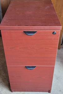 lot 80 image: 2-DRAWER FILING CABINET IN STYLE, COLOR, AND CONDITION SHOWN. APPROX. 15.75W x 22.5D x 29H.