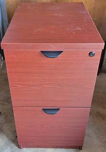 lot 81 image: 2-DRAWER FILING CABINET IN STYLE, COLOR, AND CONDITION SHOWN. APPROX. 15.75W x 22.5D x 29H.