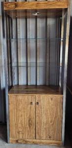 lot 46 image: ILLUMINATED DISPLAY CABINET WITH GLASS SHELVES MODEL 8044 IN STYLE, COLOR, AND CONDITION SHOWN. APPROX. 31W x 15.5D x 72H.