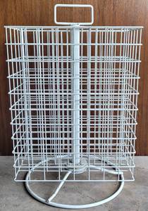 lot 48 image: COUNTERTOP ROTATING WIRE DISPLAY STAND AS SHOWN.