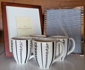 lot 123 image: POTTERY BARN GROUPING INCLUDES BLACK AND WHITE SWIRL & STRIPE MUGS, BRANDED FRAMES