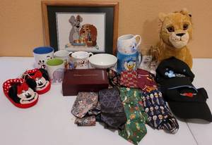 lot 229 image: DISNEY COLLECTIBLES. INCLUDES FRAMED NEEDLEPOINT LADY & THE TRAMP, BOX, HATS, PLUSH, TIES, MUGS PLUS