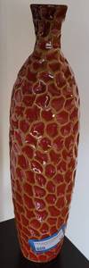 lot 12 image: DECORATIVE BOTTLE  BUD VASE IN STYLE, COLOR, AND CONDITION SHOWN. APPROX. 19 12 H x 5 12 W.