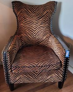 lot 15 image: UTTERMOST ACCENT CUSHIONED CHAIR IN STYLE, COLOR, AND CONDITION SHOWN. MATCHES LOT #1 APPROX. 31 W x 32 D x 43 H.