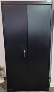 lot 24 image: SANDUSKY TWO-DOOR METAL CABINET AS SHOWN. APPROX. 36 W x 18 D x 72 H.