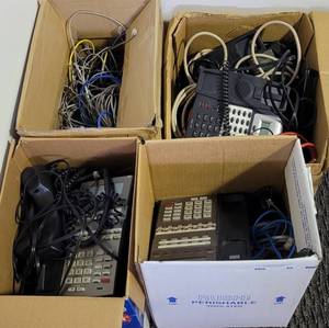 lot 48 image: (4) BOXES WITH PHONES, CORDS, AND MORE AS SHOWN.