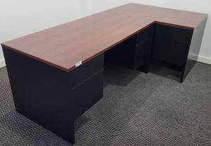 lot 59 image: 2-SECTION OFFICE DESK IN STYLE AND COLOR SHOWN. UNIT IS IN SOLID OVERALL CONDITION.