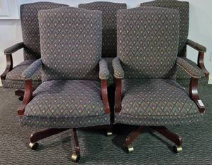 lot 64 image: (5) WOOD FRAME WITH CUSHIONED SEATS AND BACKRESTS OFFICE CHAIRS WITH CASTERS IN STYLE AND COLOR SHOWN. (SOLD 5X THE MONEY)