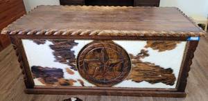 lot 84 image: MUST SEE CUSTOM MADE WOODEN OFFICE DESK WITH INTRICATE WESTERN STYLE  TEXAS STAR CARVINGS AND COWHIDE ACCENTS AS SHOWN. APPROX. 72 L x 34 12 W x 31 H.
