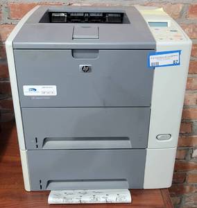 lot 87 image: HP LASERJET P3005N PRINTER AS SHOWN.